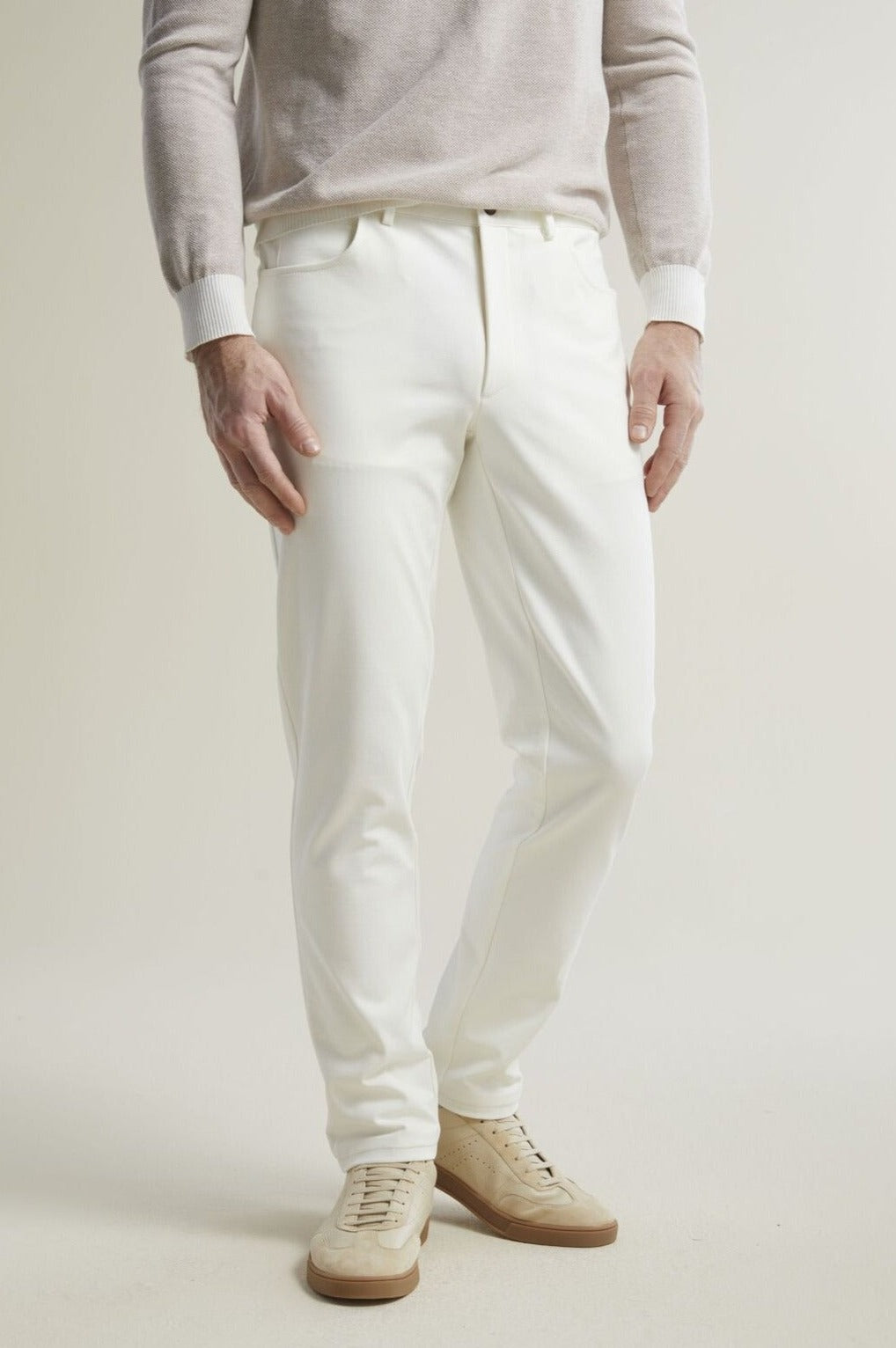 White Moleskin Knit 5-Pocket Pants Designed for work or play, a versatile 5-pocket pant stylish enough to wear with a tailored jacket, but as comfortable as your favorite jeans. Tailored in a modern fit of fabric woven in Italy, our White Moleskin Knit 5-Pocket Pant is durable, soft, and supremely comfortable.  This style features 5 pockets and light construction designed for ease of movement and wearability. 